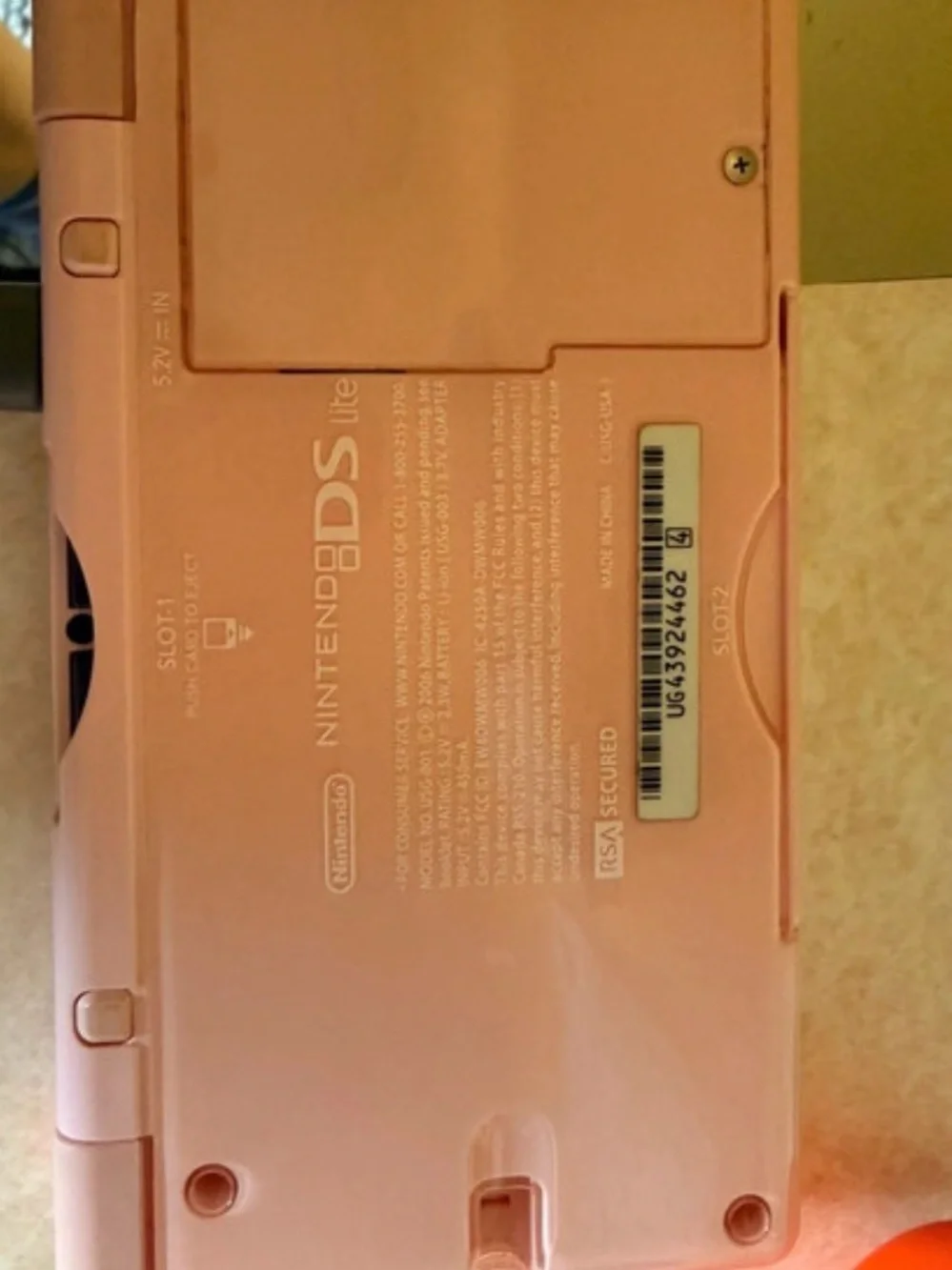 Nintendo Pink DS Lite Handheld with Five Nintendo DS Game Cases